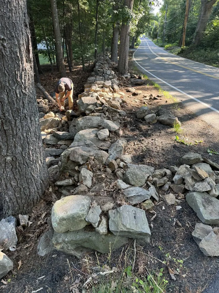 Professional yard maintenance for beautiful yards in Stow, MA by Wright Landscapes