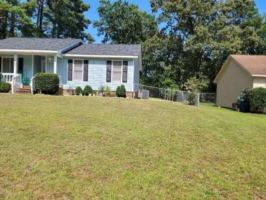 WT & J Lawn Care Services Logo