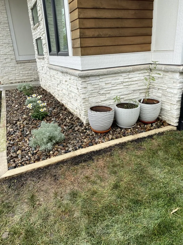 Custom landscape installation in Pleasant Hill, IA by Xpress Landscaping