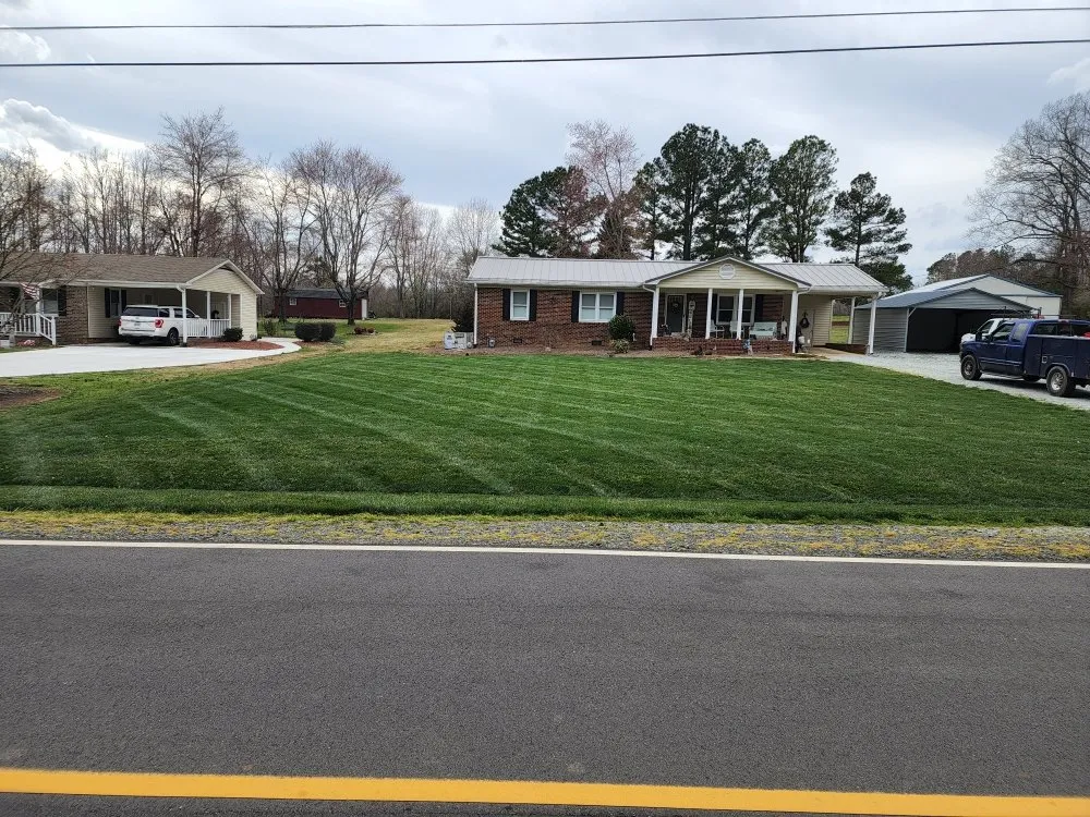 Professional yard cleanup service for homes in Roxboro, NC by Xtreme Green