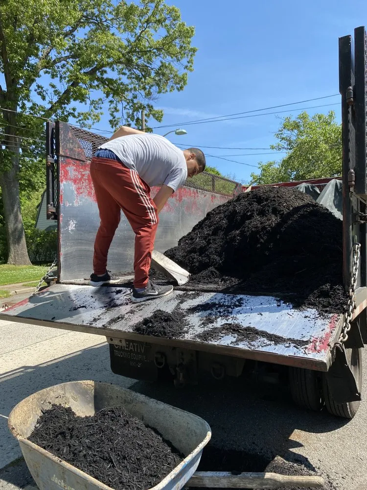 Custom garden landscaping for year-round maintenance in Freeport, NY by Xtreme Landscaping