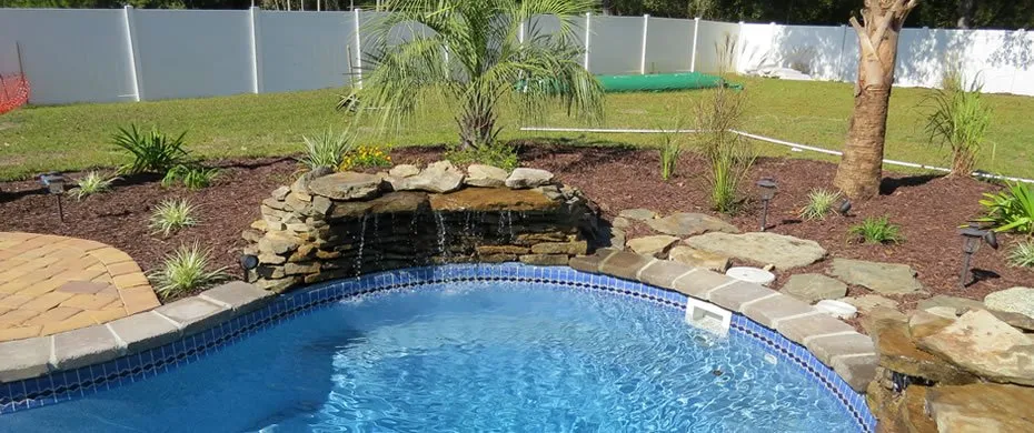 Professional outdoor landscaping for residential properties in Myrtle Beach, SC by Xtreme Pools & Hardscapes