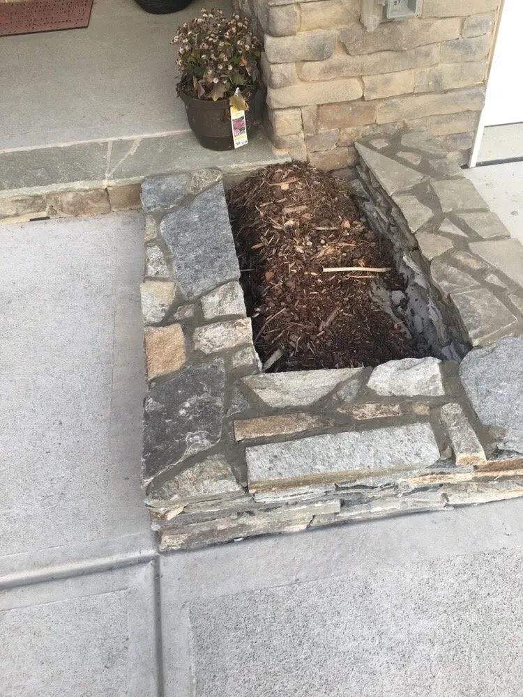 Custom landscape installation with custom design across Raleigh, NC - Y---------e Landscape