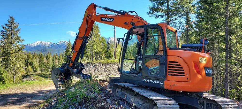 Custom lawn mowing service in Kalispell, MT by yaak river contracting