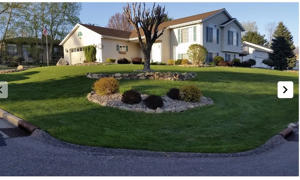 Professional landscape design with custom design in Wausau, WI by Yach's Lawn Care