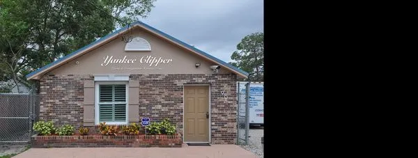 Yankee Clipper Lawn & Irrigation Services Logo