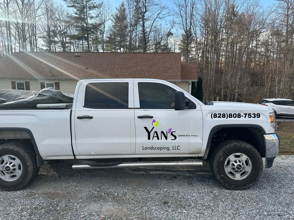 Professional lawn mowing service in Hendersonville, NC by Yan's Landscaping