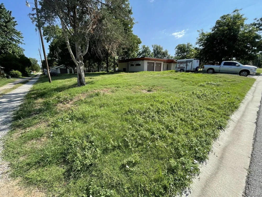 Custom landscape installation in Ponca City, OK by Yard Barber