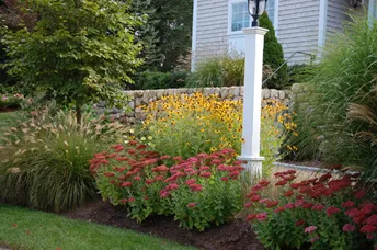 Professional yard cleanup service for homes in Mattapoisett, MA by Yard Boss Landscape Design