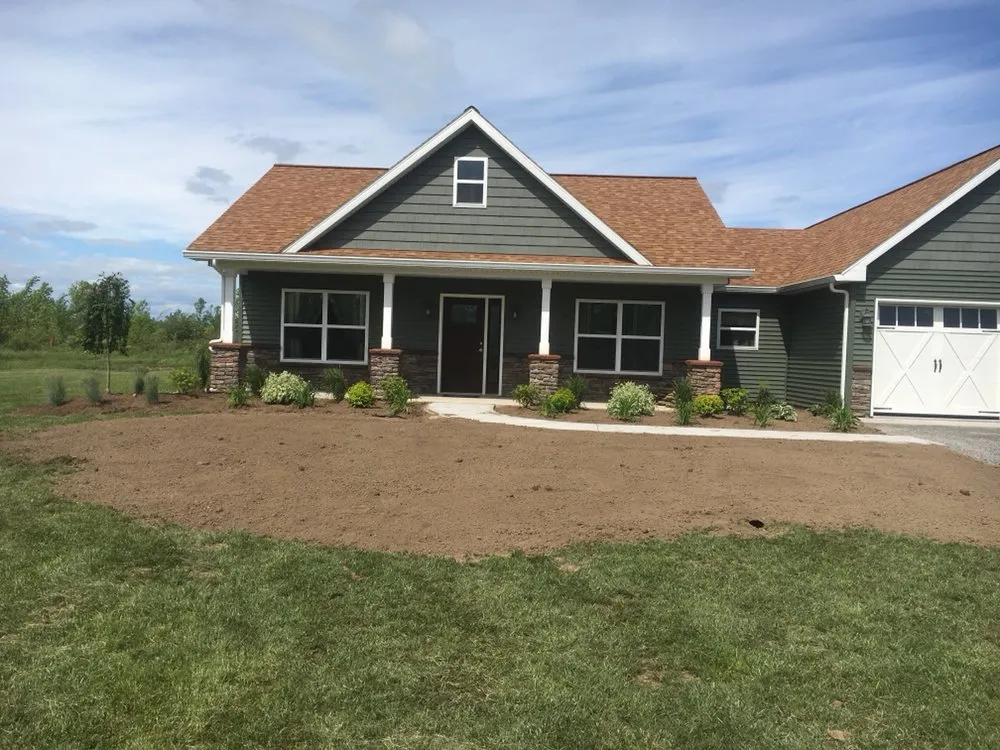 Custom landscaping services for outdoor upgrades across Chaumont, NY - Yard By Yard