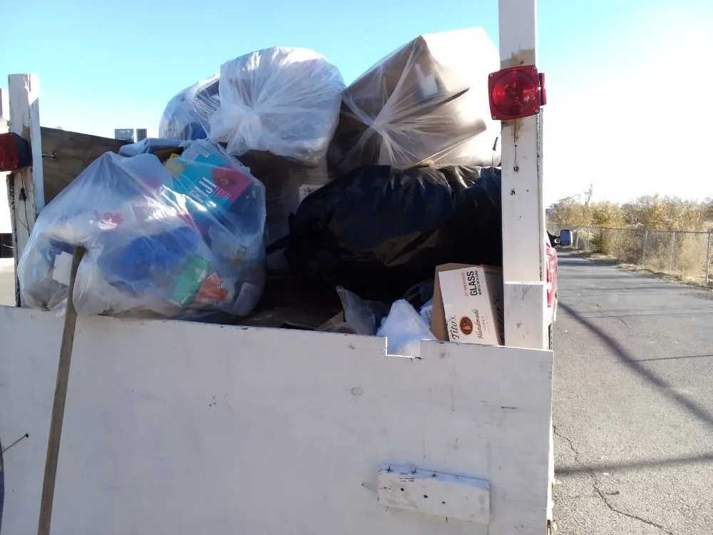 Custom lawn mowing service for year-round maintenance across Las Vegas, NM - yard cleaning hauling loading & dumping