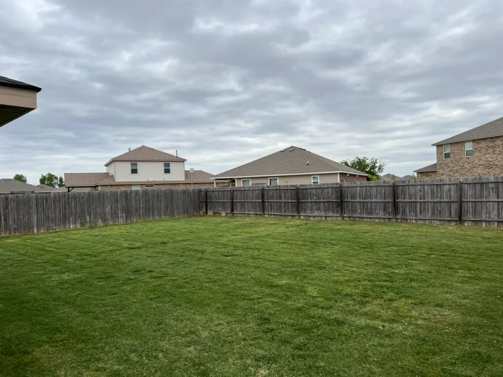 Trusted yard maintenance for homes in Yukon, OK by Yard Dawgz