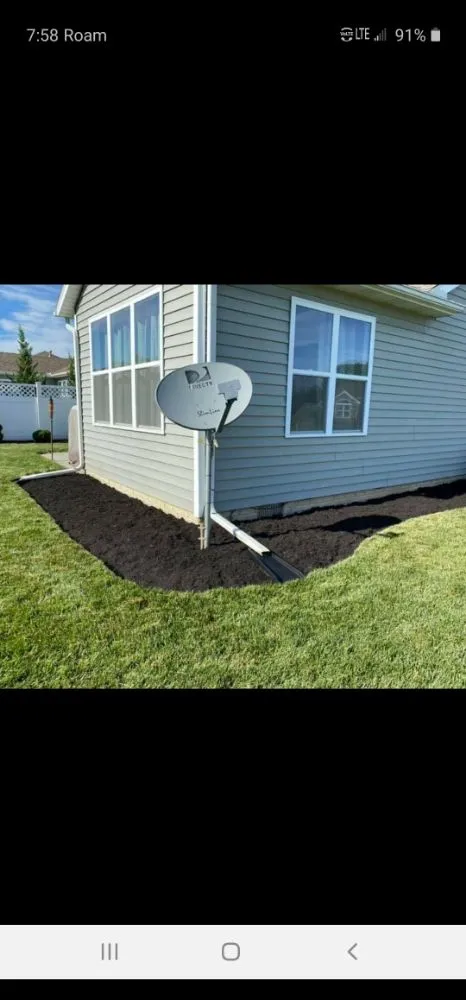 Custom yard cleanup service for residential properties in Perrysburg, OH by Yard Machine Lawn And Landscape