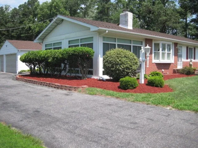 Custom landscape installation for residential properties in Georgetown, DE by Yard Shark