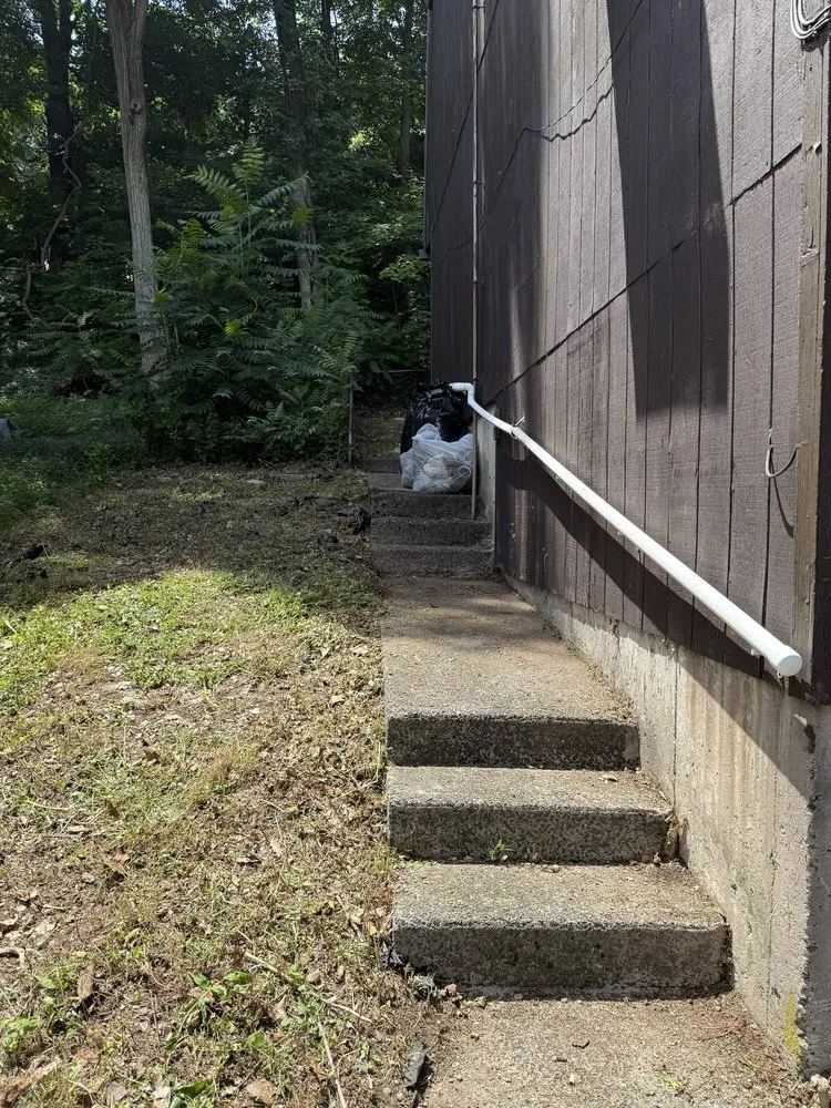 Affordable yard cleanup service for homes in Waterbury, CT by Yard Wizards