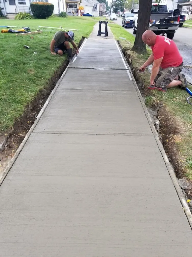 Expert yard cleanup service for homes in Elmira, NY by Yard Wolves Landscaping