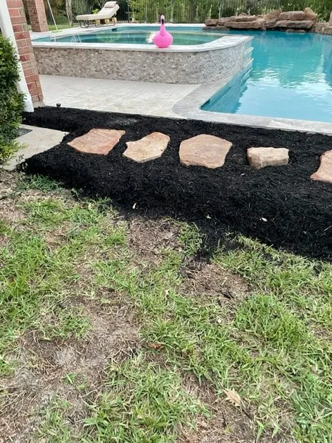 Custom garden landscaping for residential properties in Friendswood, TX by Yard Works Gulf Coast