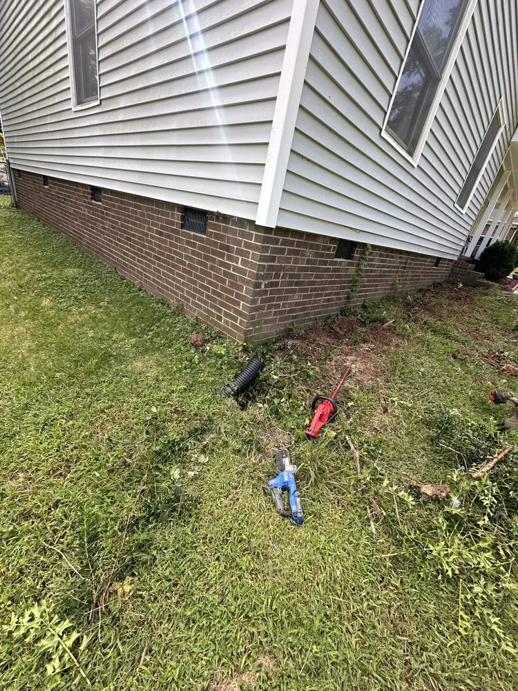 Professional yard cleanup service for homes in Durham, NC by Yardie Boyzz