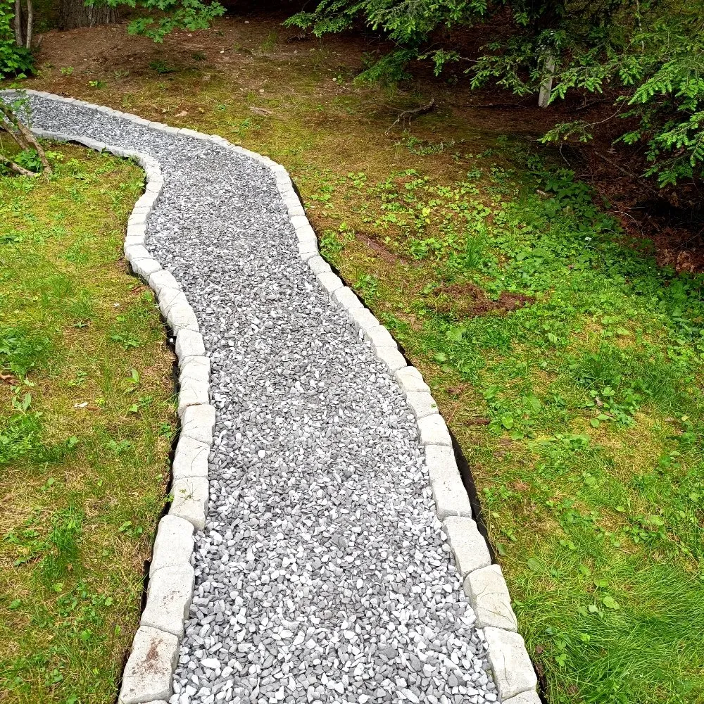 Custom residential landscaping for year-round maintenance in Pembroke, MA by YardRise Landscaping