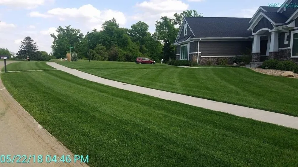 Trusted lawn care service for beautiful yards in Iowa City, IA by YARDS by Wes