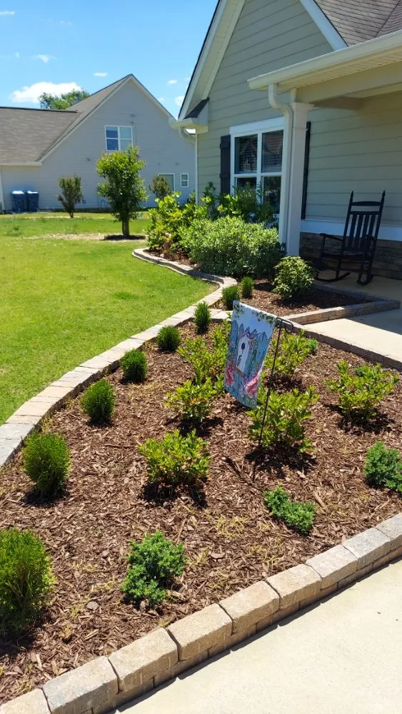 Custom garden landscaping for year-round maintenance across Statham, GA - Yardscapes Plus