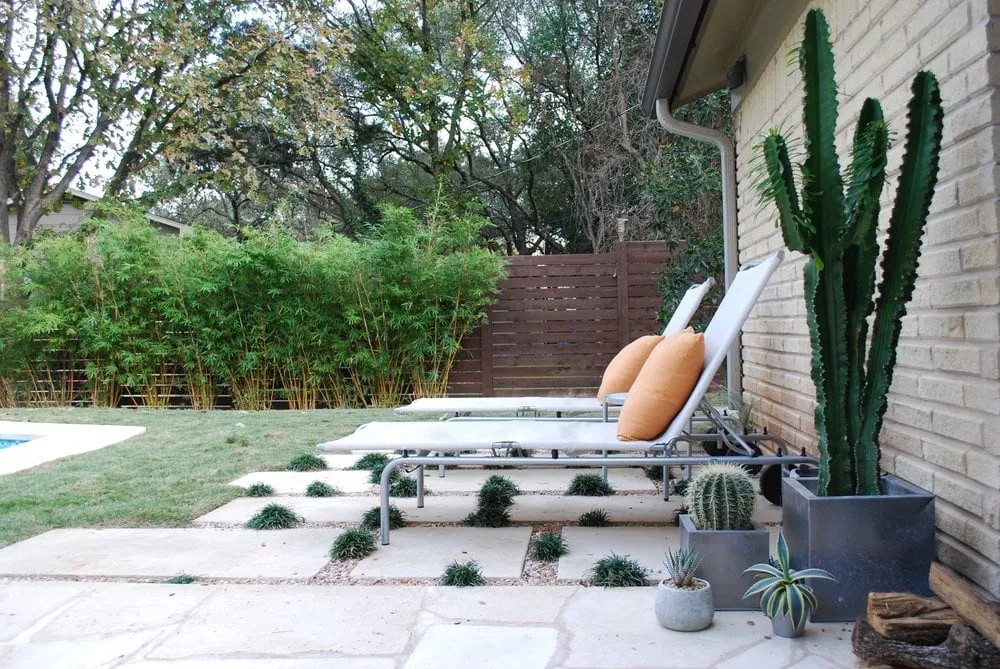 Reliable lawn mowing service with custom design in Austin, TX by Yarrow Landscaping