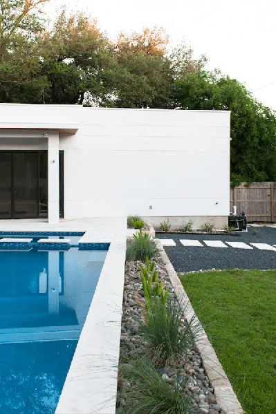 Affordable yard maintenance with custom design in Austin, TX by Yarrow Landscaping