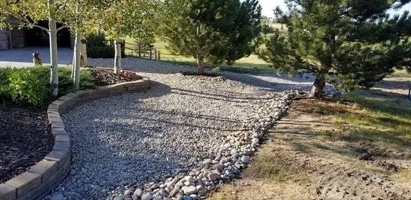 Affordable lawn mowing service with custom design in Colorado Springs, CO by Year Round Landscaping & Fences