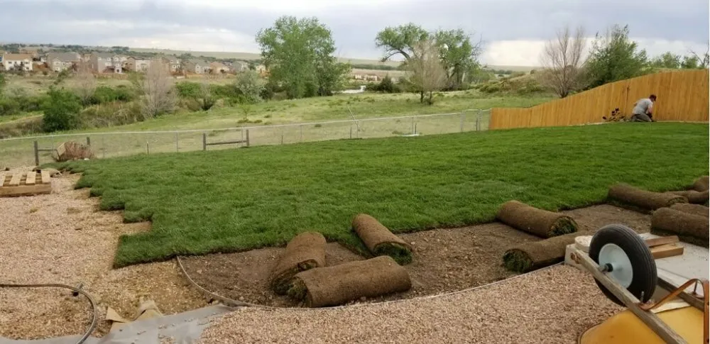 Custom lawn mowing service for outdoor upgrades in Colorado Springs, CO by Year Round Landscaping & Fences
