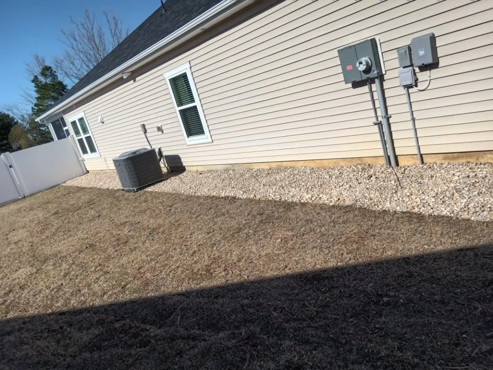 Reliable lawn mowing service for year-round maintenance across Sunset Beach, NC - Year Round Lawn & Landscape