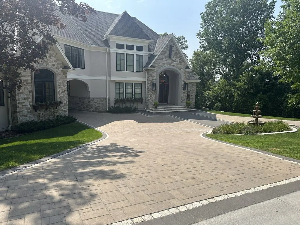 Reliable lawn mowing service for year-round maintenance across Brooklyn Park, MN - Yellow Brick Road Pavers & Landscapes