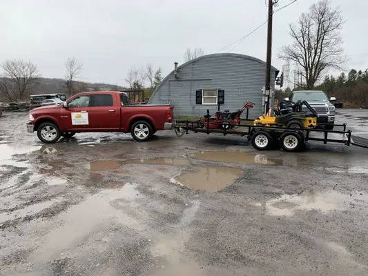 Yellow Hat Mowers Logo