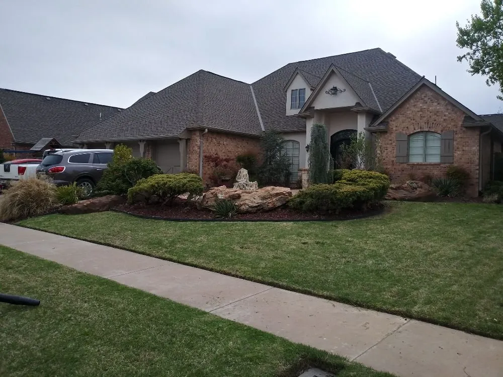 Custom landscape design for residential properties in Lawton, OK by Yeshua Lawn care & Home Services