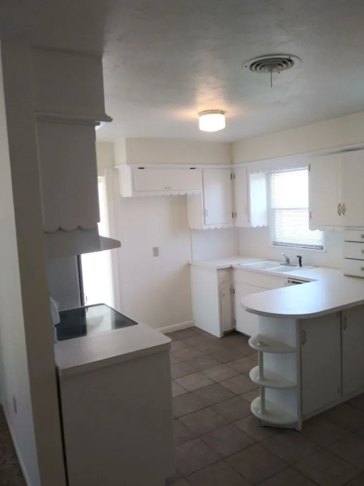 Custom outdoor landscaping with custom design in Lawton, OK by Yeshua Lawn care & Home Services