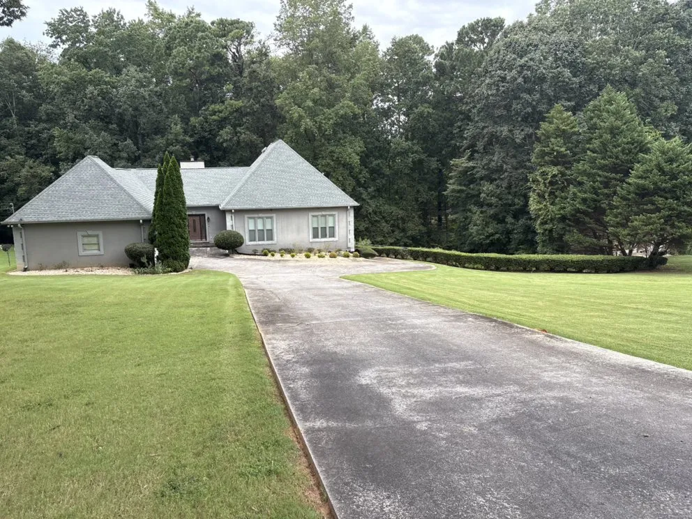 Expert yard cleanup service for residential properties in Fairburn, GA by Yeti Custom Homes