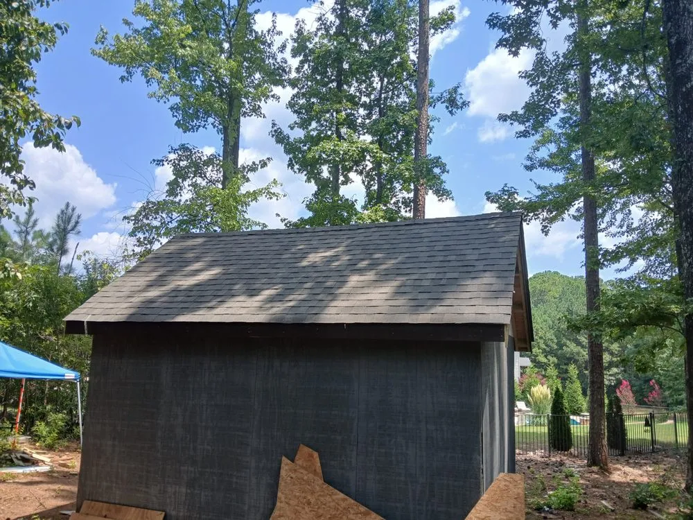 Professional lawn mowing service for residential properties in Atlanta, GA by YLS Lopez Roofing Solutions