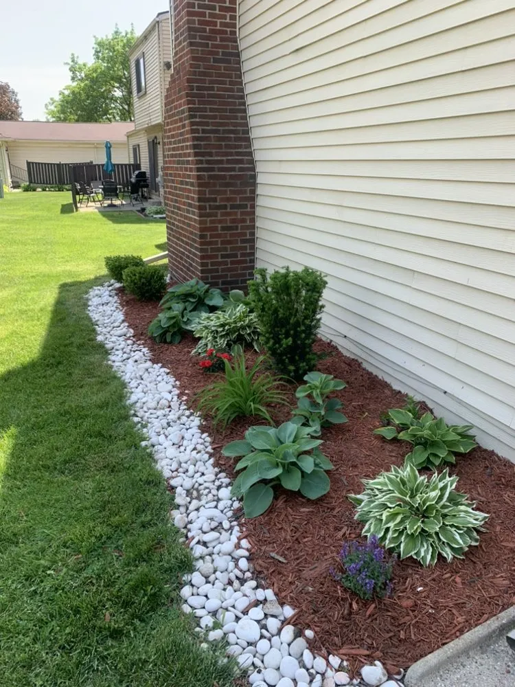 Expert garden landscaping for year-round maintenance in Detroit, MI by YnM Landscaping