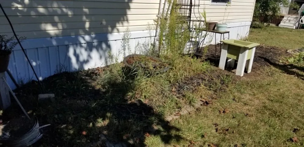 Professional landscape installation with custom design in Ypsilanti, MI by Yo's 2nd Pair of Handz