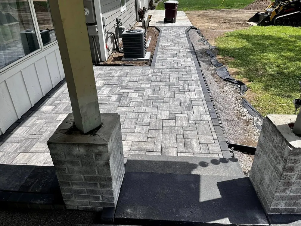 Custom outdoor landscaping for year-round maintenance in Lakeville, MN by You Betcha Outdoor Services