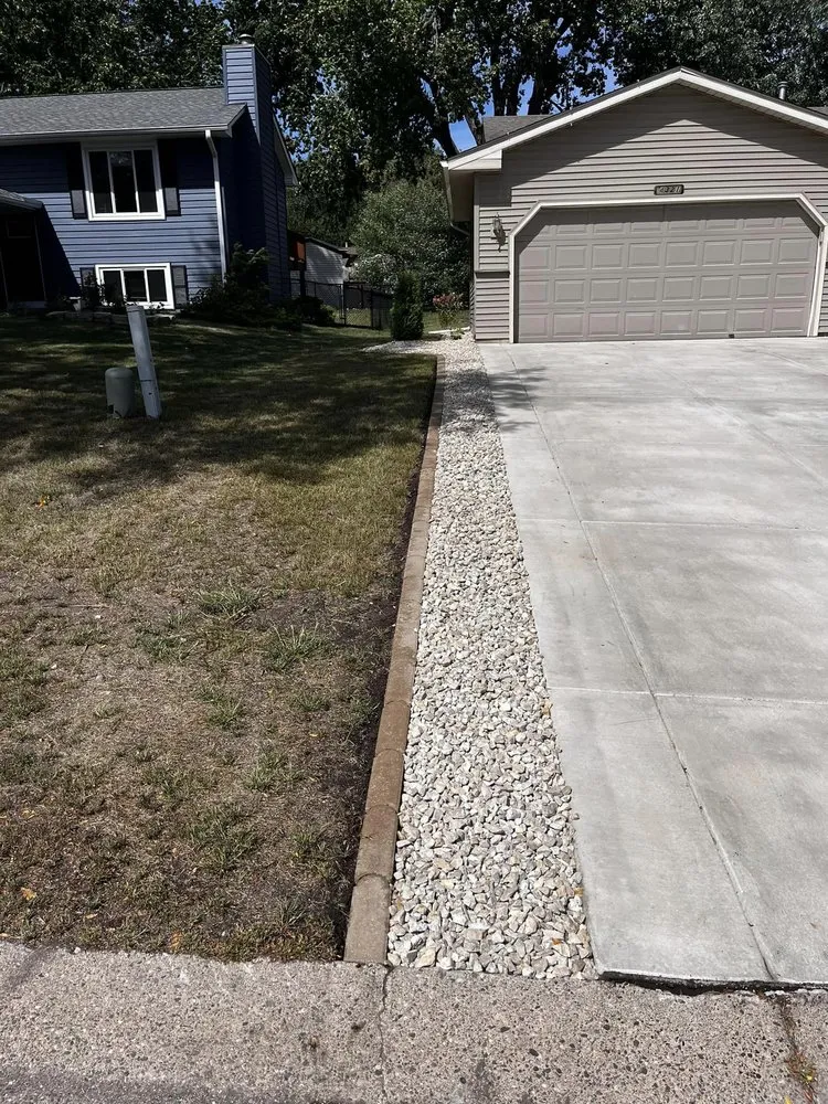 Expert yard cleanup service in Lakeville, MN by You Betcha Outdoor Services