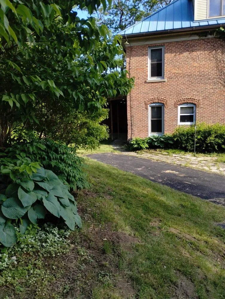 Reliable yard cleanup service for residential properties across Mazomanie, WI - You Grow It We Mow It