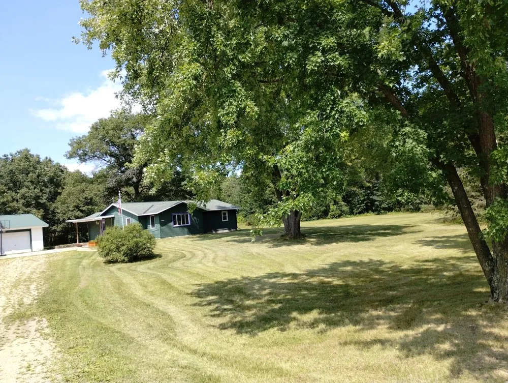 Professional residential landscaping for year-round maintenance in Mazomanie, WI by You Grow It We Mow It