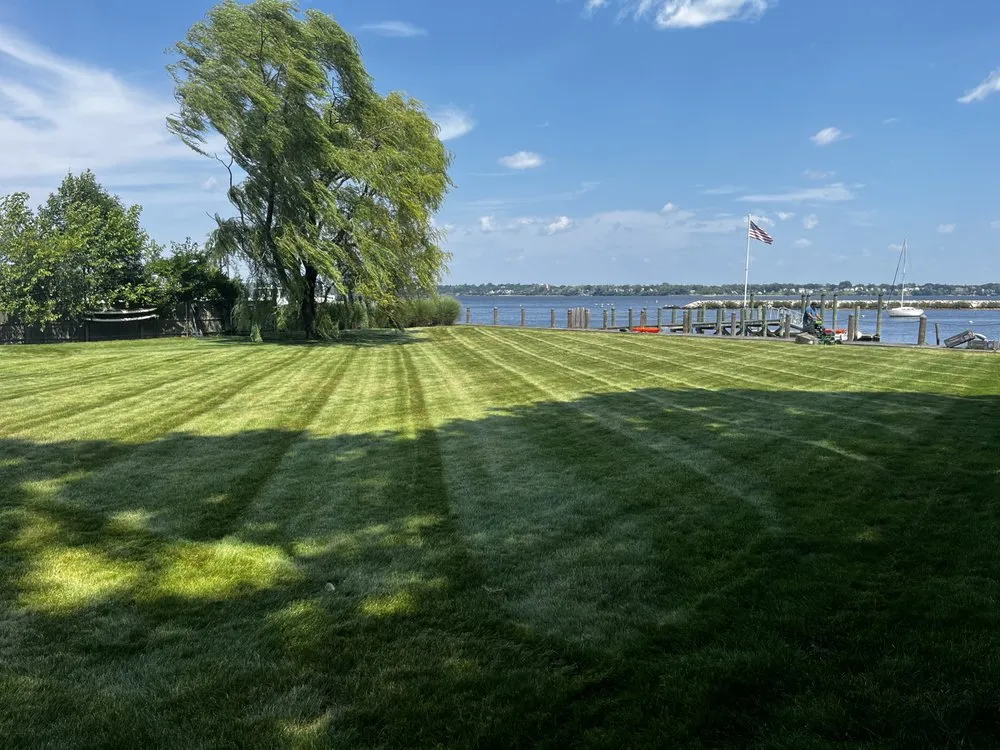 Trusted lawn care service for residential properties in West Warwick, RI by You Grow It We Mow It