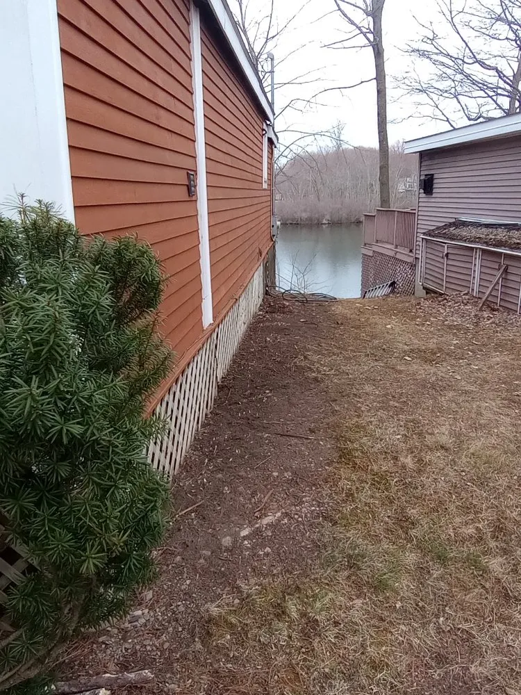 Expert lawn care service with custom design in Bennington, VT by Young & Son's Tree Care and General Contracting