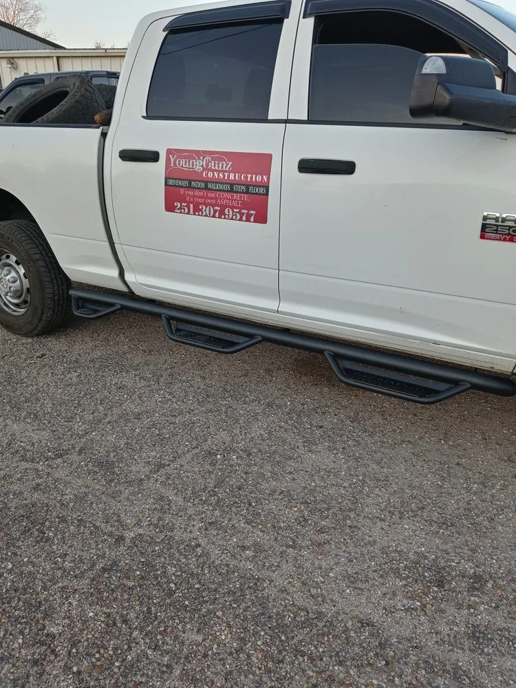 Professional landscape design for residential properties in Mobile, AL by Young Guns Construction