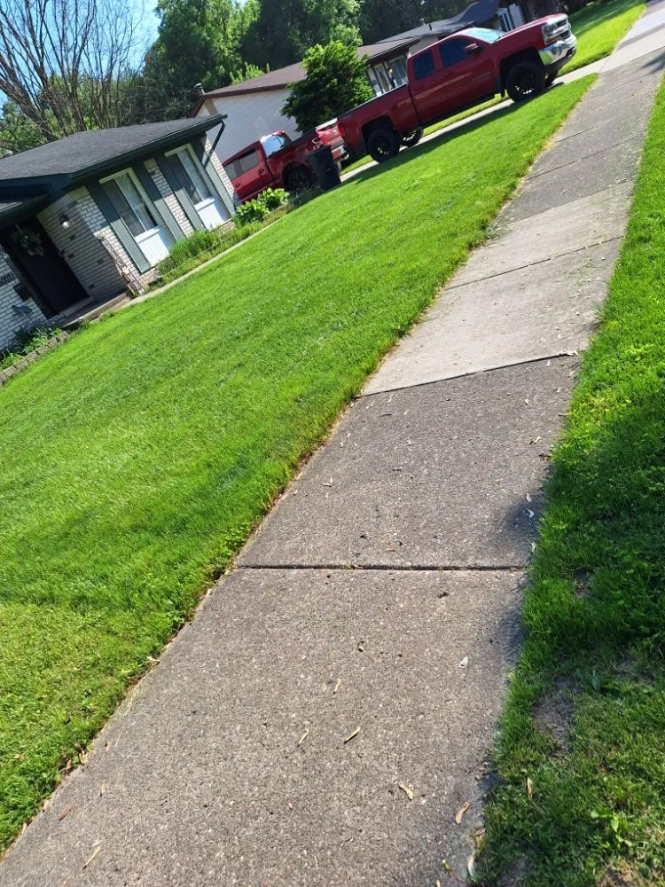 Expert lawn mowing service near you across Romulus, MI - Your Cut