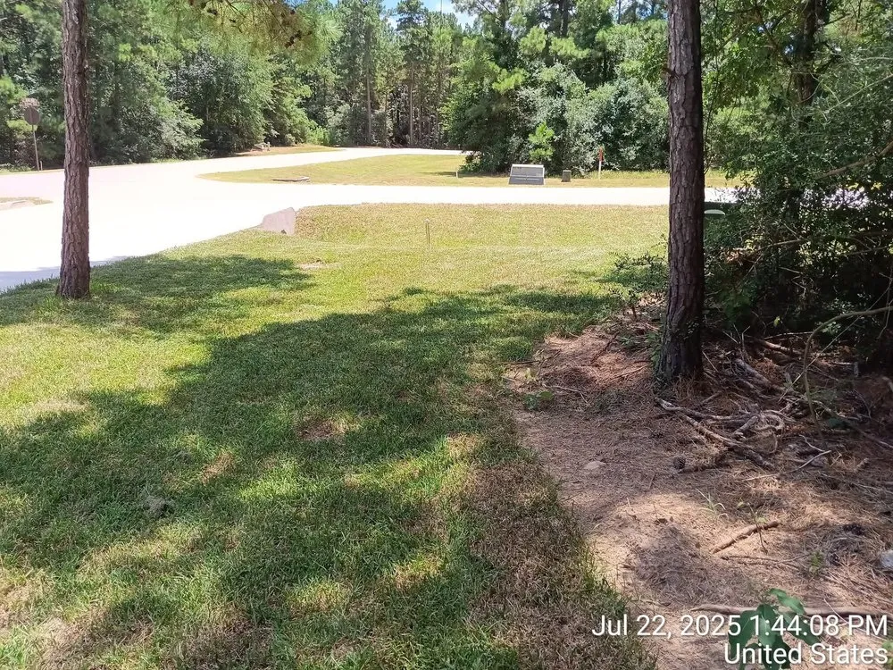 Custom outdoor landscaping for beautiful yards in Conroe, TX by Your Ditch Is Ugly