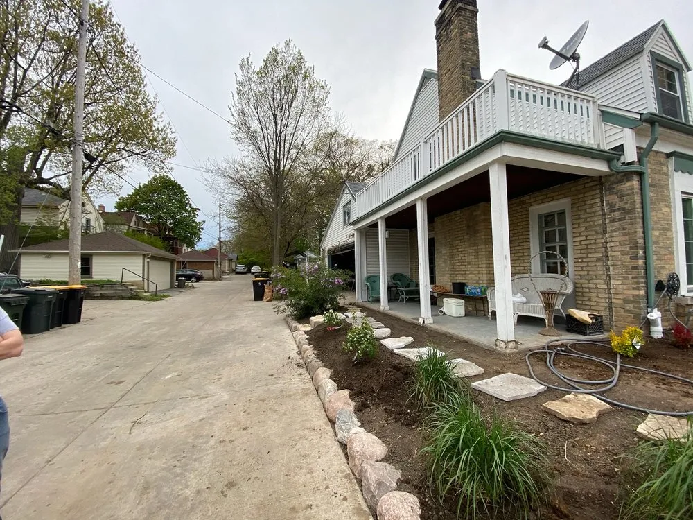 Professional residential landscaping for year-round maintenance in Milwaukee, WI by Your Friendly Neighbor Landscaping & Tree Service