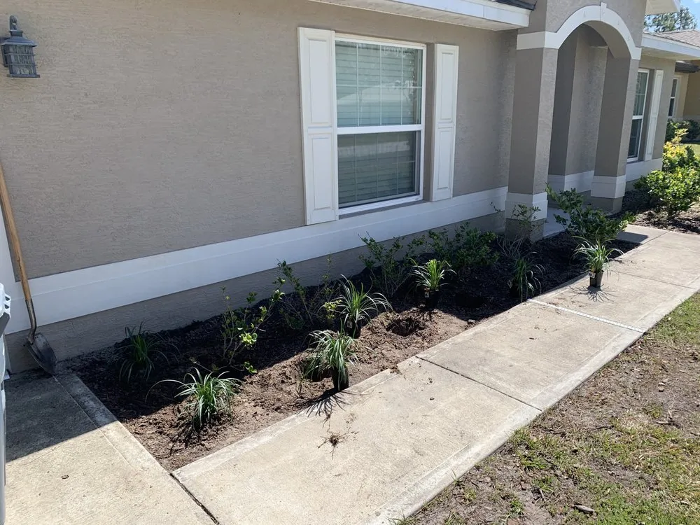 Professional yard cleanup service for beautiful yards in Palm Coast, FL by Your Landscaping Team