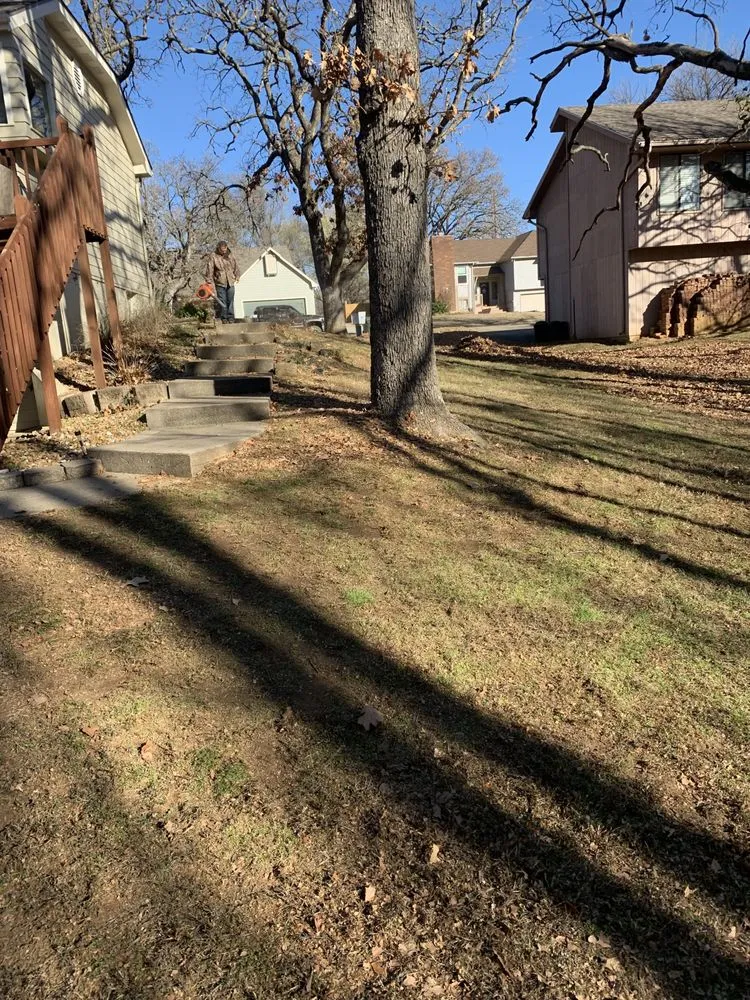 Professional yard maintenance with custom design across Nevada, MO - Your Lawn Barber